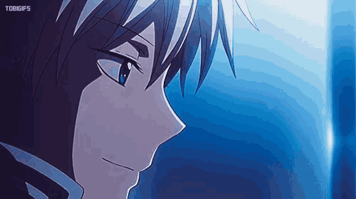 a close up of a person 's face with a blue background and a watermark that says tobigifs