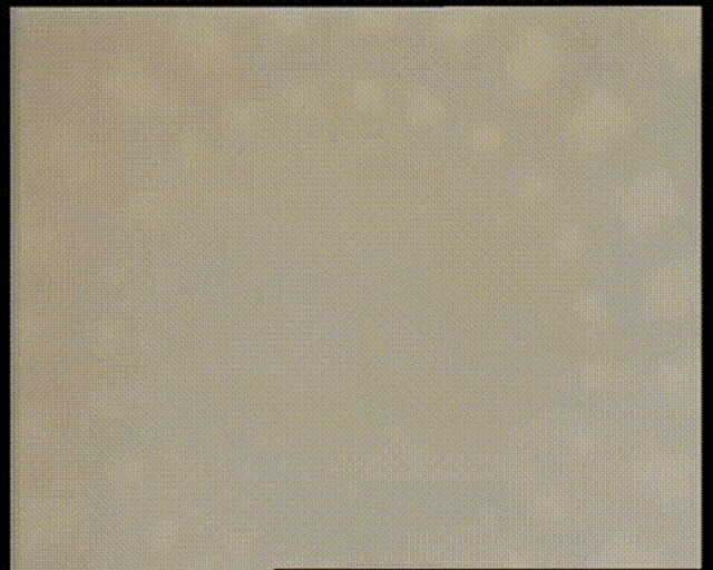 a circular pattern of yellow squares on a black background .