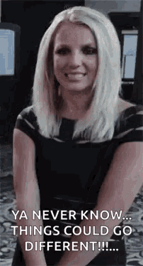 a woman in a black dress is smiling and saying `` ya never know ... things could go different ! ''