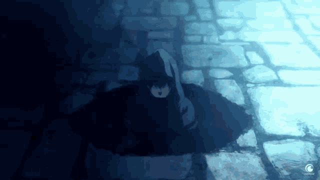 a person is crawling out of a hole in the ground in a dark room .