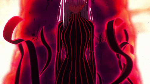 a woman in a black and red striped dress stands in front of a purple background