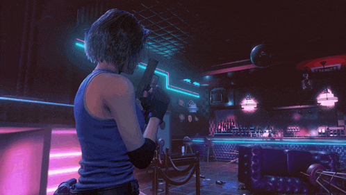 a woman is holding a gun in a dark room