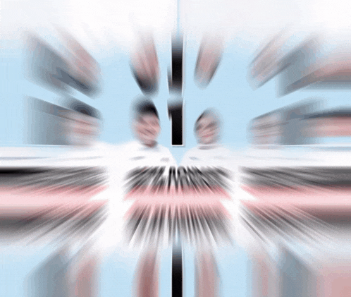 a blurry image of a person 's face with a triangle in the center