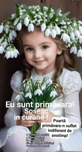 a little girl is wearing a wreath of white flowers on her head .