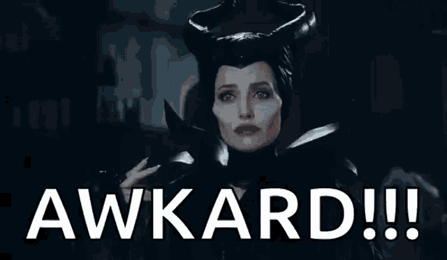 a woman in a maleficent costume with horns is holding a knife and says awkard !!
