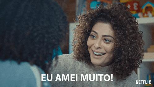 a woman kissing another woman with the words eu amei muito written below her