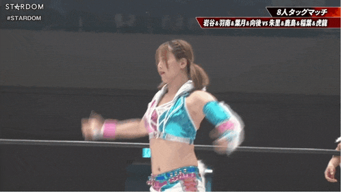 a woman in a wrestling ring with the word stardom on the top