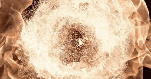 a close up of an explosion with a lot of smoke coming out of it