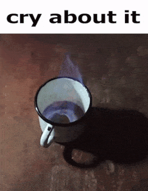 a cup with a flame coming out of it and the words cry about it below it