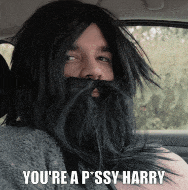 a man with a beard and a wig says you 're a p * ssy harry