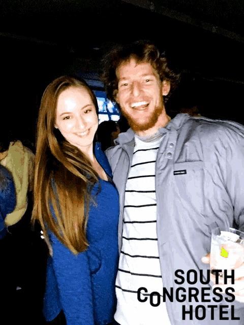 a man and a woman are posing for a picture with the words south congress hotel behind them