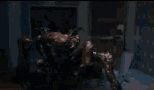 a blurred image of a monster with horns standing in a room .