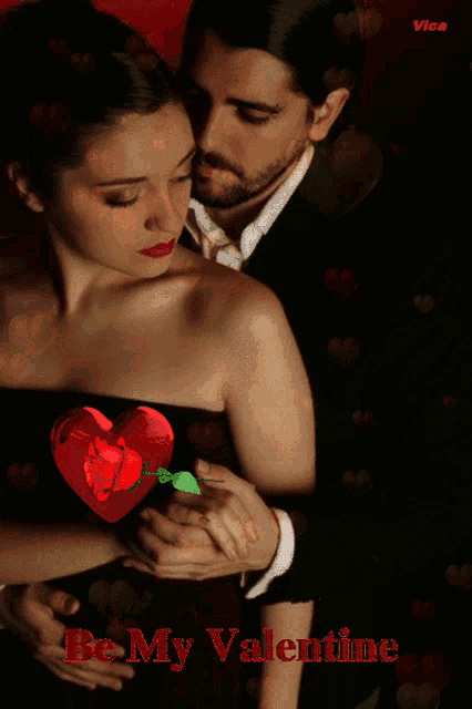 a man and a woman are hugging with a heart in the background and the words vice written on the bottom