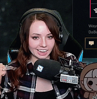 a woman is wearing headphones and holding a microphone with a sticker that says 30 on it