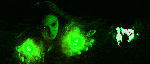 a green background with a few spots of light