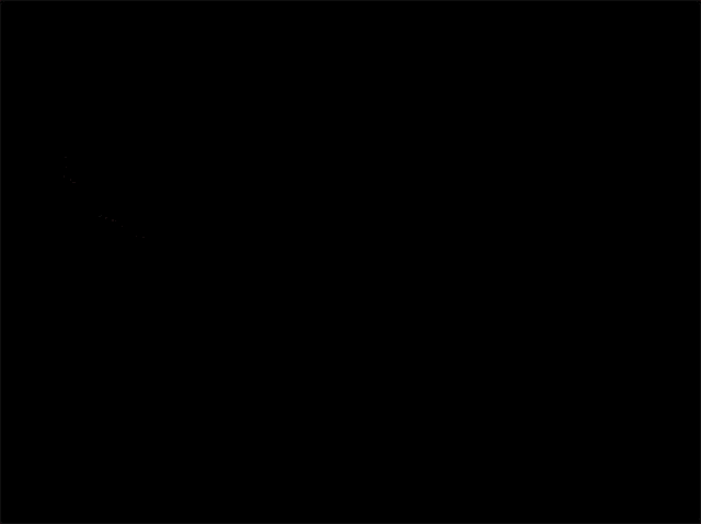 a silhouette of a person holding a sword with a red light behind him