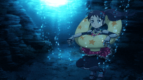 a girl in a swimsuit is swimming in the water