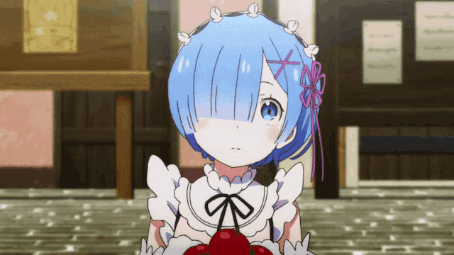 a girl with blue hair is holding a red heart