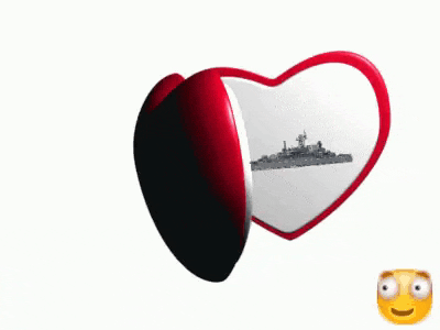 a heart shaped box with a ship inside of it .