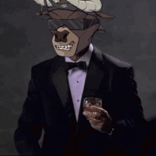 a man in a tuxedo with a cartoon bull on his head