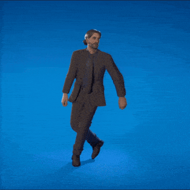 a man in a suit and tie is standing on one leg on a blue background