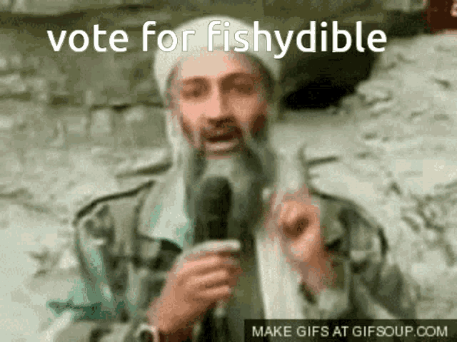 a man with a beard speaking into a microphone with the words vote for fishydible above him