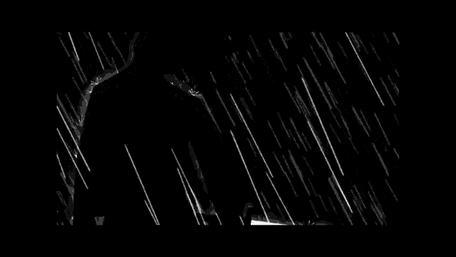 a black and white cartoon of a man with long hair in the rain .
