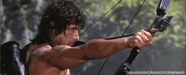 a man is holding a bow and arrow with the words embarrassing and little awkward below him