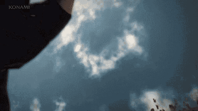 a blue sky with a konami logo on the bottom right