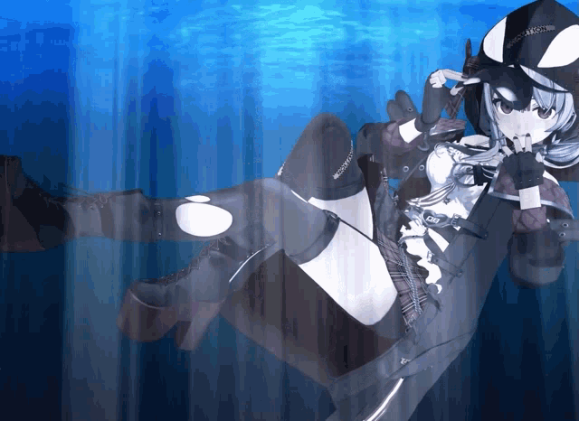 a girl with a hat that says ' orca ' on it is swimming in the ocean