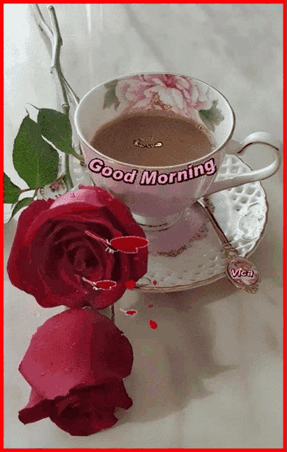 a cup of coffee on a saucer with the words good morning