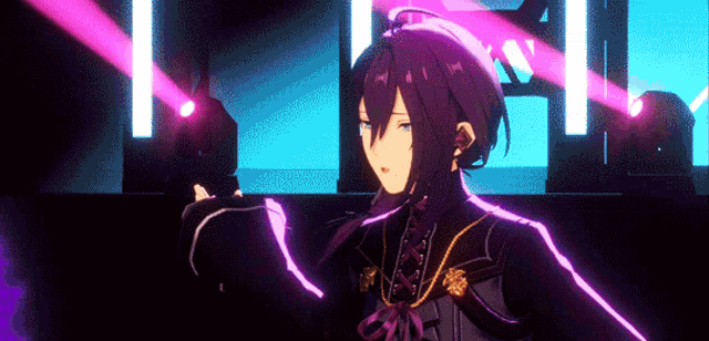 a man with purple hair is standing in front of a stage with purple lights .