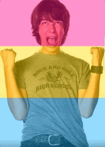 a boy wearing a rock and roll high school shirt