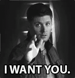 a black and white photo of a man giving the middle finger and the words i want you .