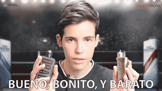 a man holding a device with the words bueno bonito y barato written below him