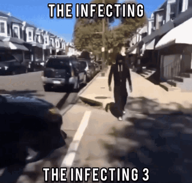 a man is walking down a street with the words the infecting the infecting 3