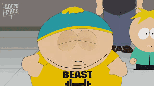a cartoon character from south park wears a yellow shirt that says beast
