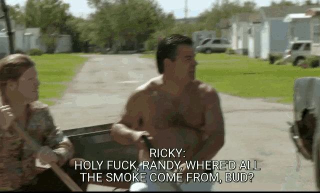 a man without a shirt is talking to a woman who is sitting in a wheelchair