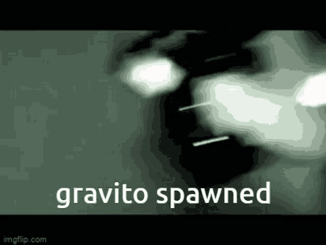 a black and white photo of a car with the words `` gravito spawned '' written in white letters .