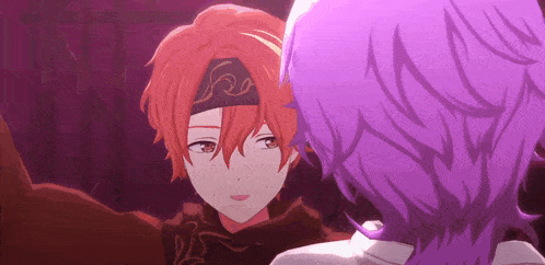 a couple of anime characters are looking at each other .