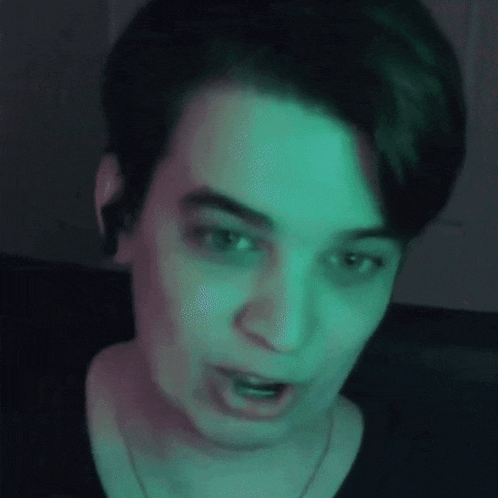 a close up of a person making a funny face