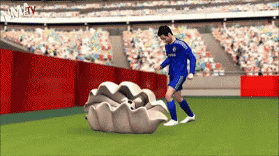 a soccer player in a blue jersey with the word chelsea on the front