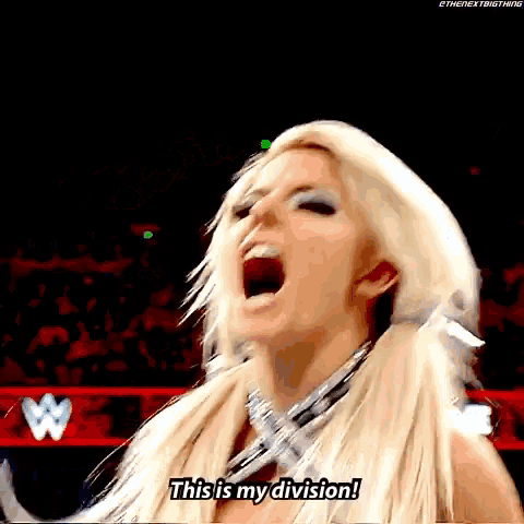 a blonde woman is screaming and saying this is my division