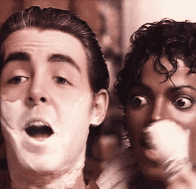 a man and a woman are making funny faces