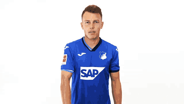 a man in a blue shirt that says sap on it