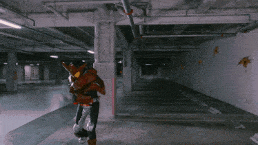 a blurred image of a hallway with a few spots of blood on the wall