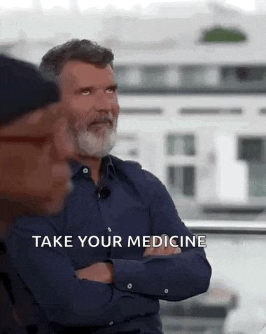 a man with a beard is talking to another man with the words take your medicine written on the bottom