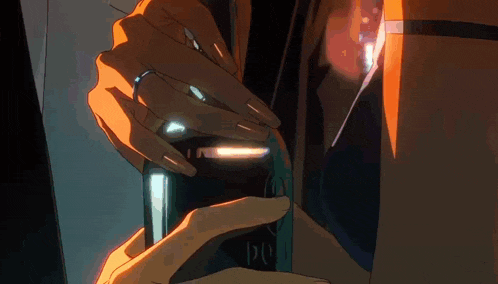 a close up of a person 's hand holding a bottle with the letter p on the label