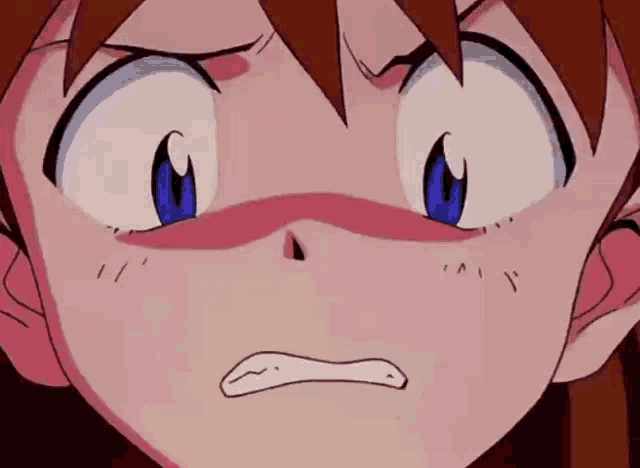 a close up of a cartoon character 's face with a very angry expression