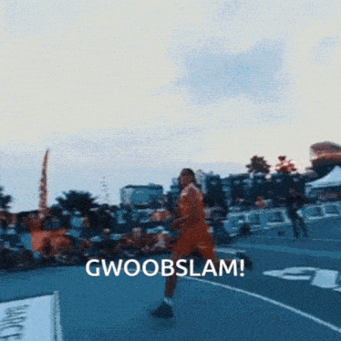 a basketball player is jumping in the air with the words gwoobslam written below him